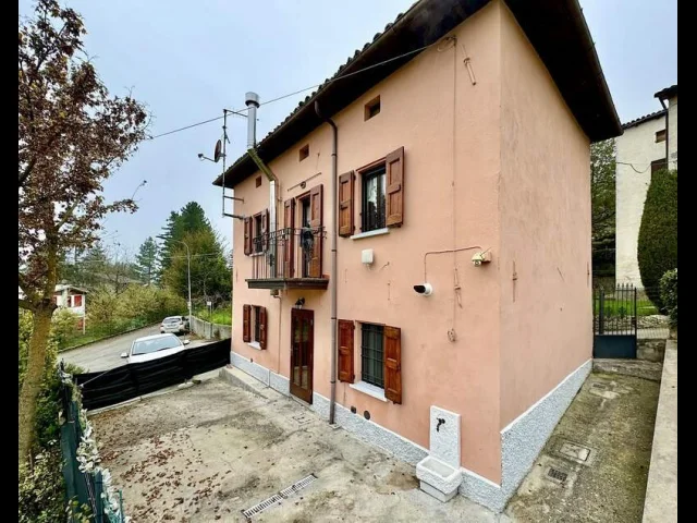 Casa con giardino