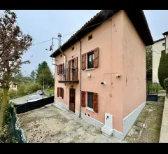 Casa con giardino
