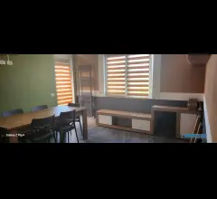 Camera con bagno e cucina condivisa
