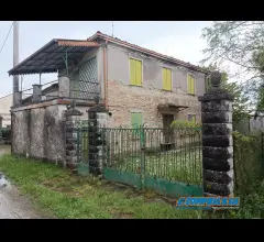 Casa con giardino
