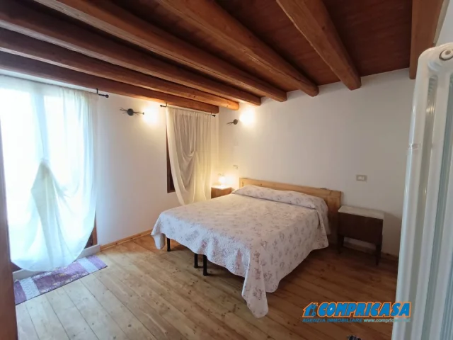 Camera con aree condivise