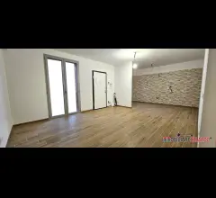 Appartamenti in Vendita - Appartamento di nuova costruzione con giardino e garage