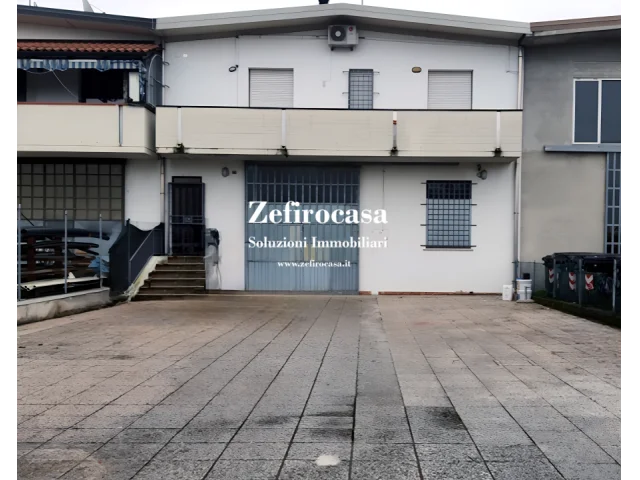 San giovanni in p. - laboratorio/magazzino e appartamento