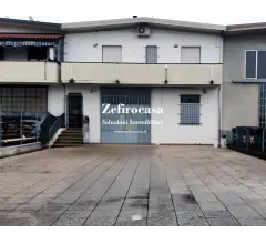 San giovanni in p. - laboratorio/magazzino e appartamento