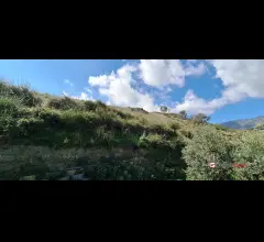 Appartamenti in Vendita - Camaro, panoramico e pianeggiante terreno con deposito