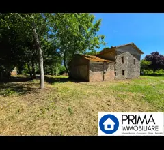 Appartamenti in Vendita - Rudere con terreni, nella splendida cornice delle colline umbre