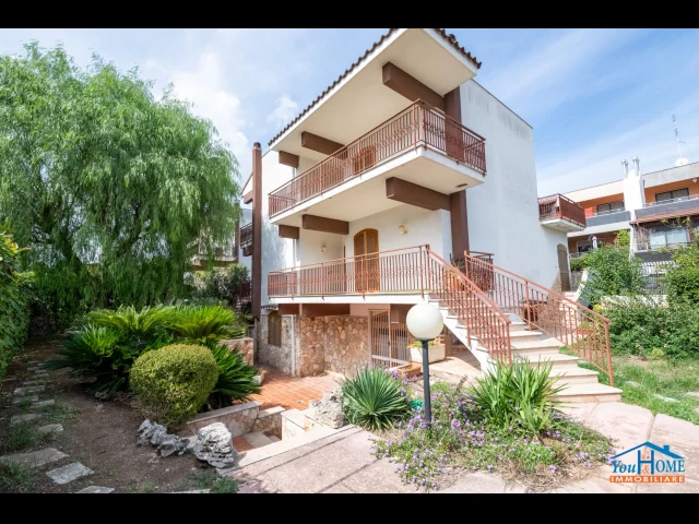 Villa con giardino