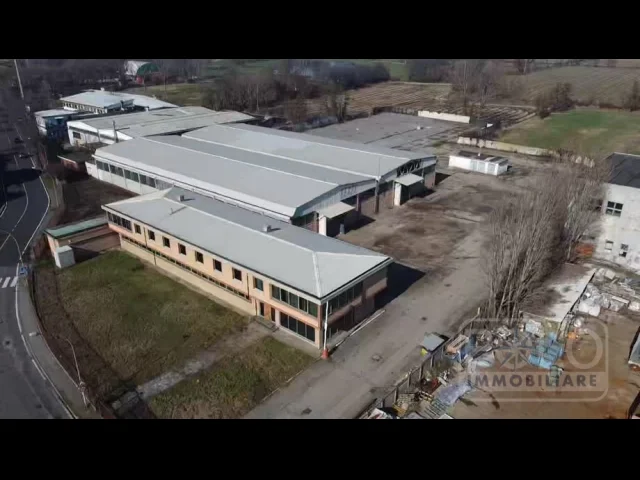 Capannone con palazzina uffici e area esterne per 9500 mq
