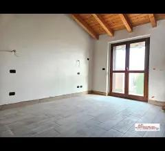 Appartamento con travi a vista a sedriano