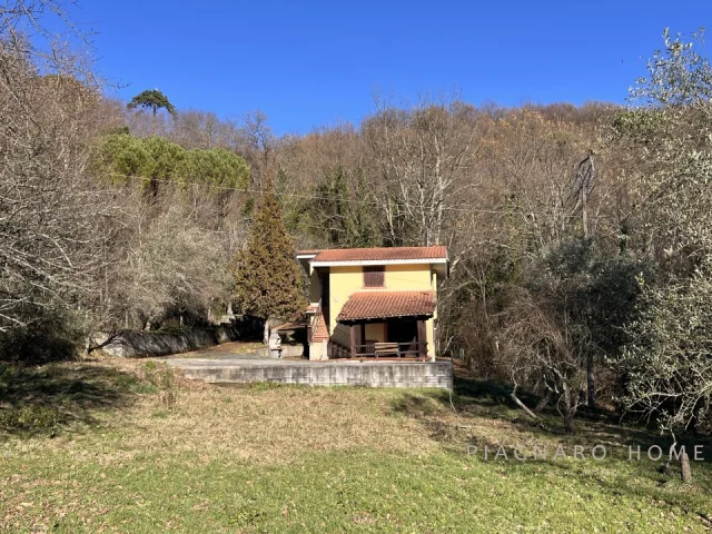 Villa con giardino