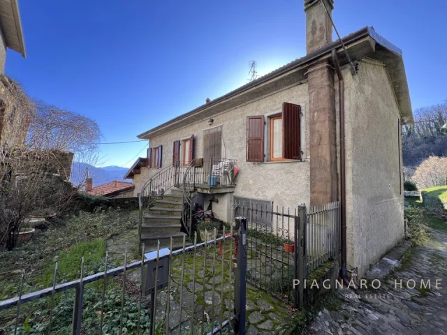Casa con giardino