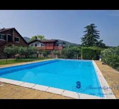 Appartamenti in Vendita - Porzione di villa con terrazza giardino e piscina condominiale a garlenda golf