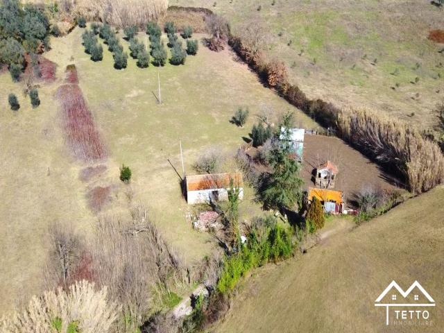 Case - Terreno agricolo con magazzino e pozzo