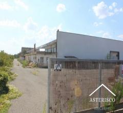 Fabbricato  industriale e terreni edificabili - via enrico mattei, n. 91 - asciano (si)