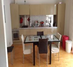 Elegante trilocale con ampio salone