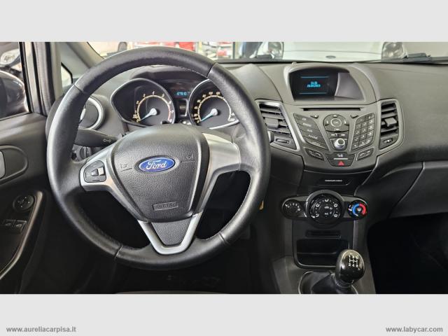 Auto - Ford fiesta 1.4 5p. bz.- gpl titanium