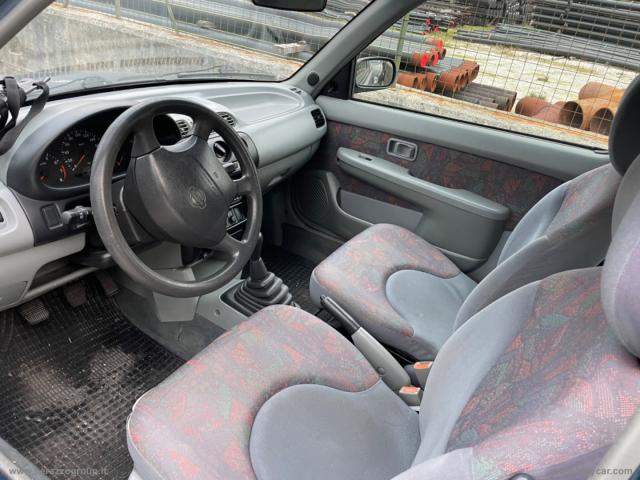 Auto - Nissan micra 1.0 16v 3p. comfort