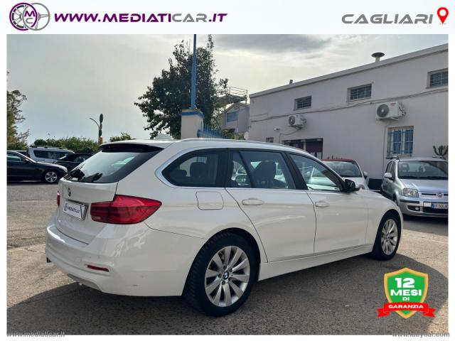 Auto - Bmw 316d touring business advantage aut.