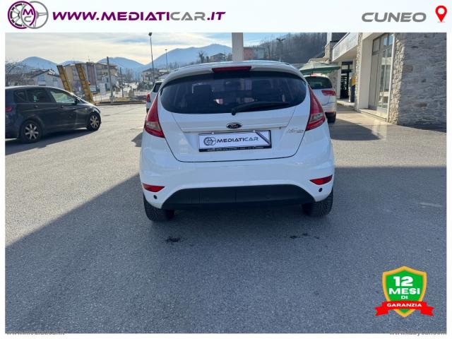 Auto - Ford fiesta 1.4 5p. bz.- gpl titanium