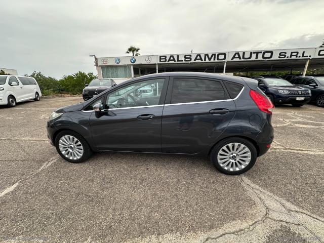 Auto - Ford fiesta 1.4 3p. bz.- gpl titanium