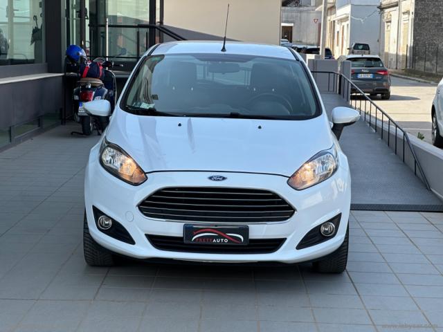 Auto - Ford fiesta 1.4 5p. bz.- gpl titanium