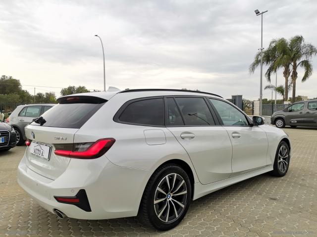 Auto - Bmw 318d touring business advantage aut.