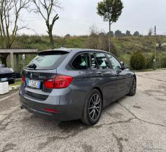 Auto - Bmw 320d touring business aut.