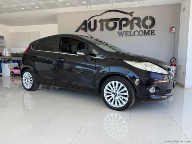 Auto - Ford fiesta 1.4 5p. bz.- gpl titanium